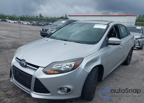 2012 Ford Focus Titanium z USA, uszkodzony, nr VIN 1FAHP3J28CL381248